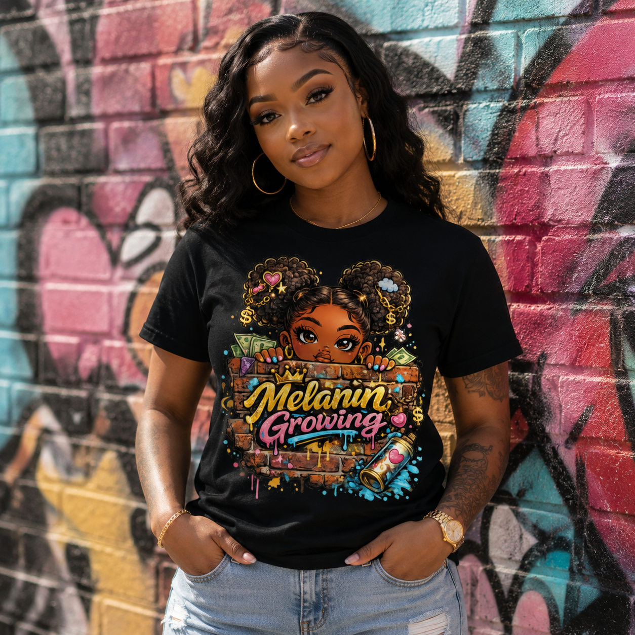 Black woman wearing Melanin Growing black t-shirt with graffiti brick wall design and afro puff girl graphic
